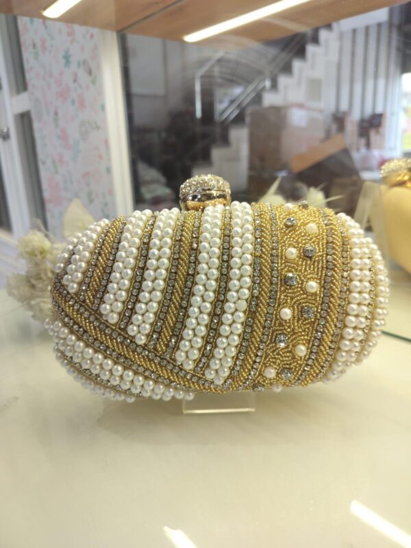 golden white beads clutch